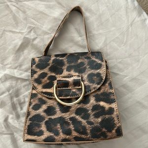 Used leopard handbag